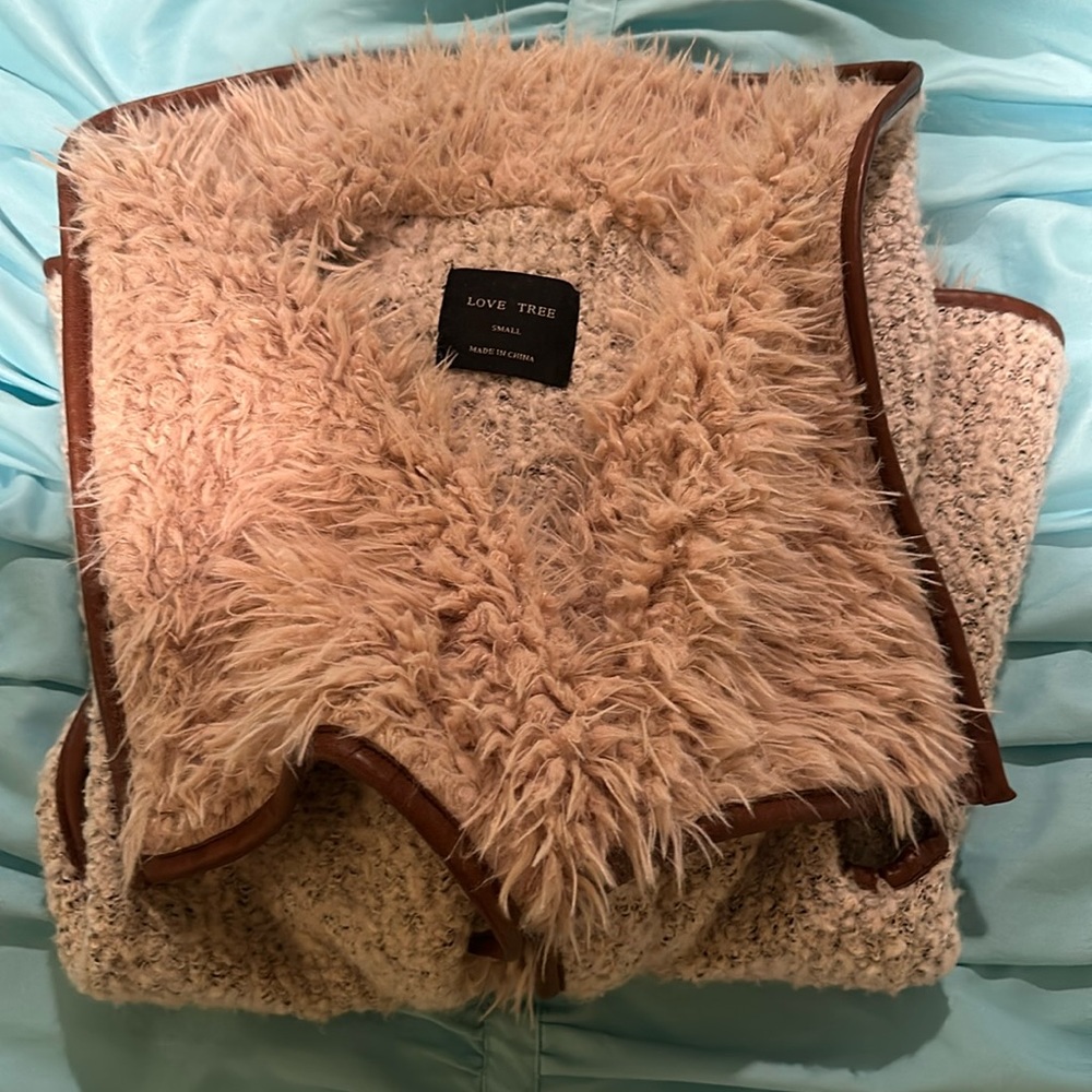 Super cute, furry vest small